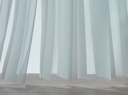 Quiet and breezy. Veri Shades verticle blinds let the breezes in without the clatter of classic blinds